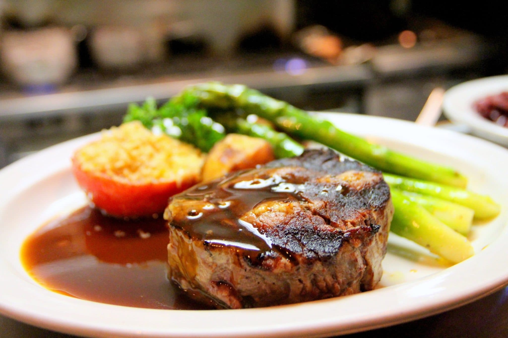 Steak with asparagus and a rich sauce